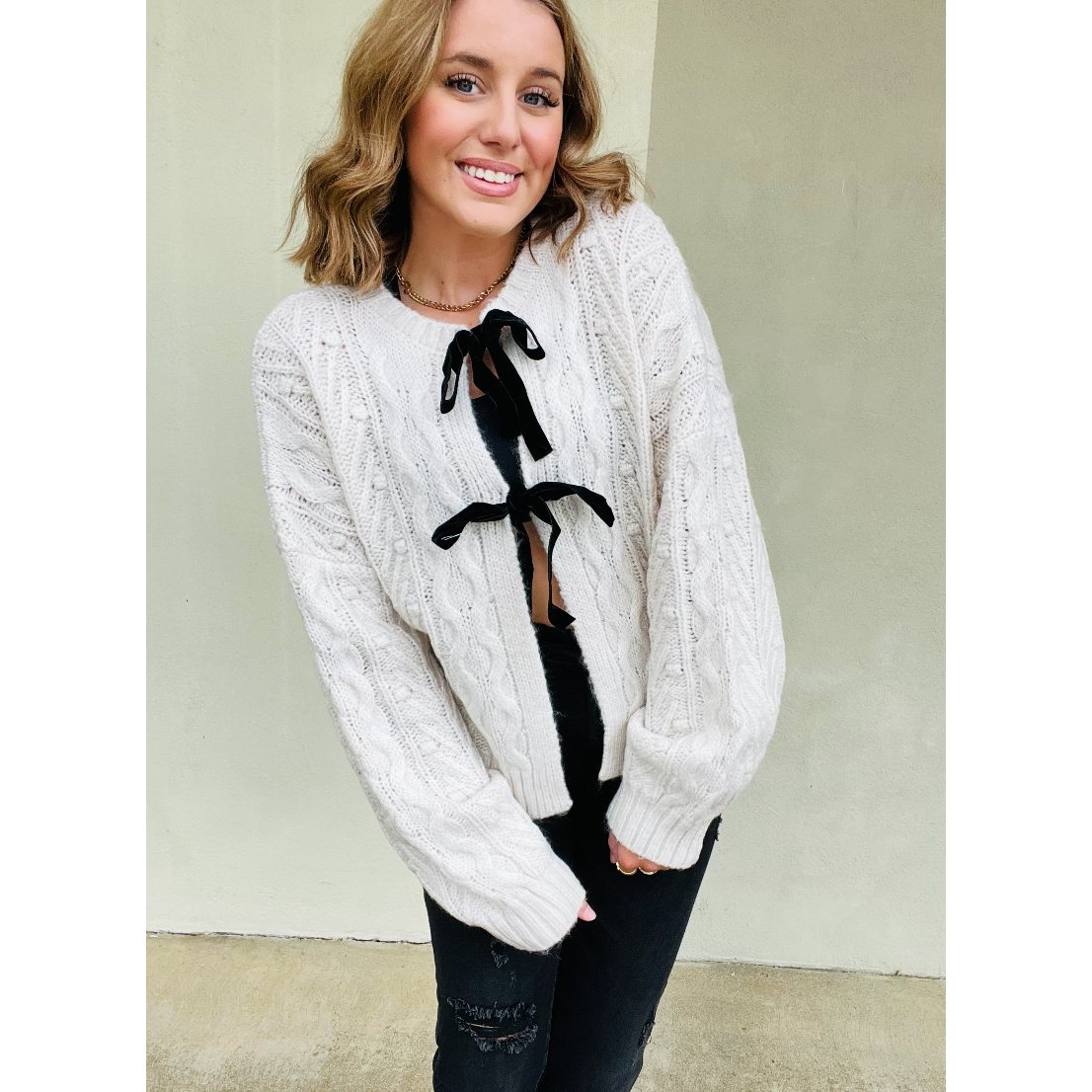 Cardigan en tricot torsadé, élégant avec nœud en velours